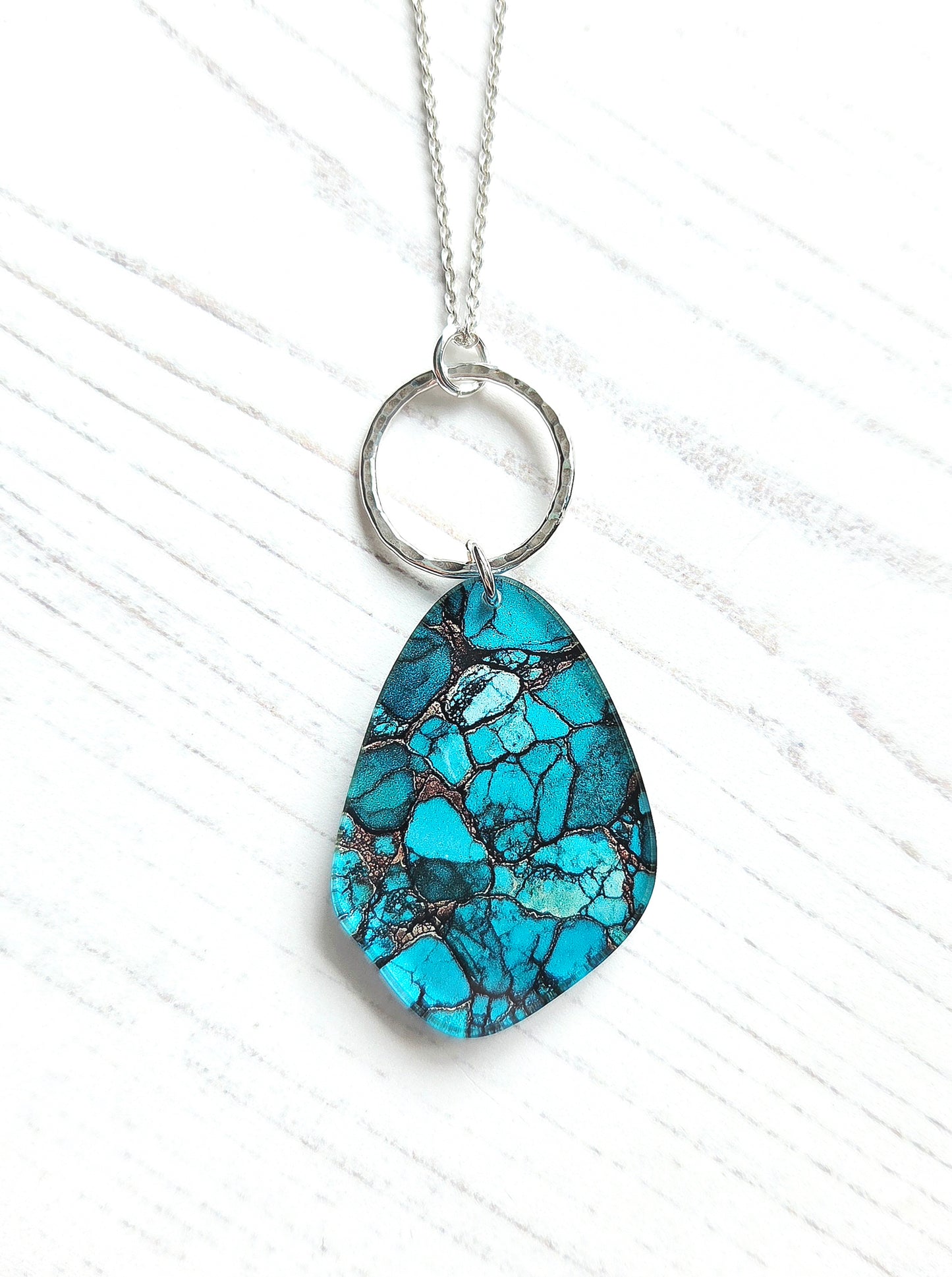 Pebble and hammered circle pendant, natural turquoise print