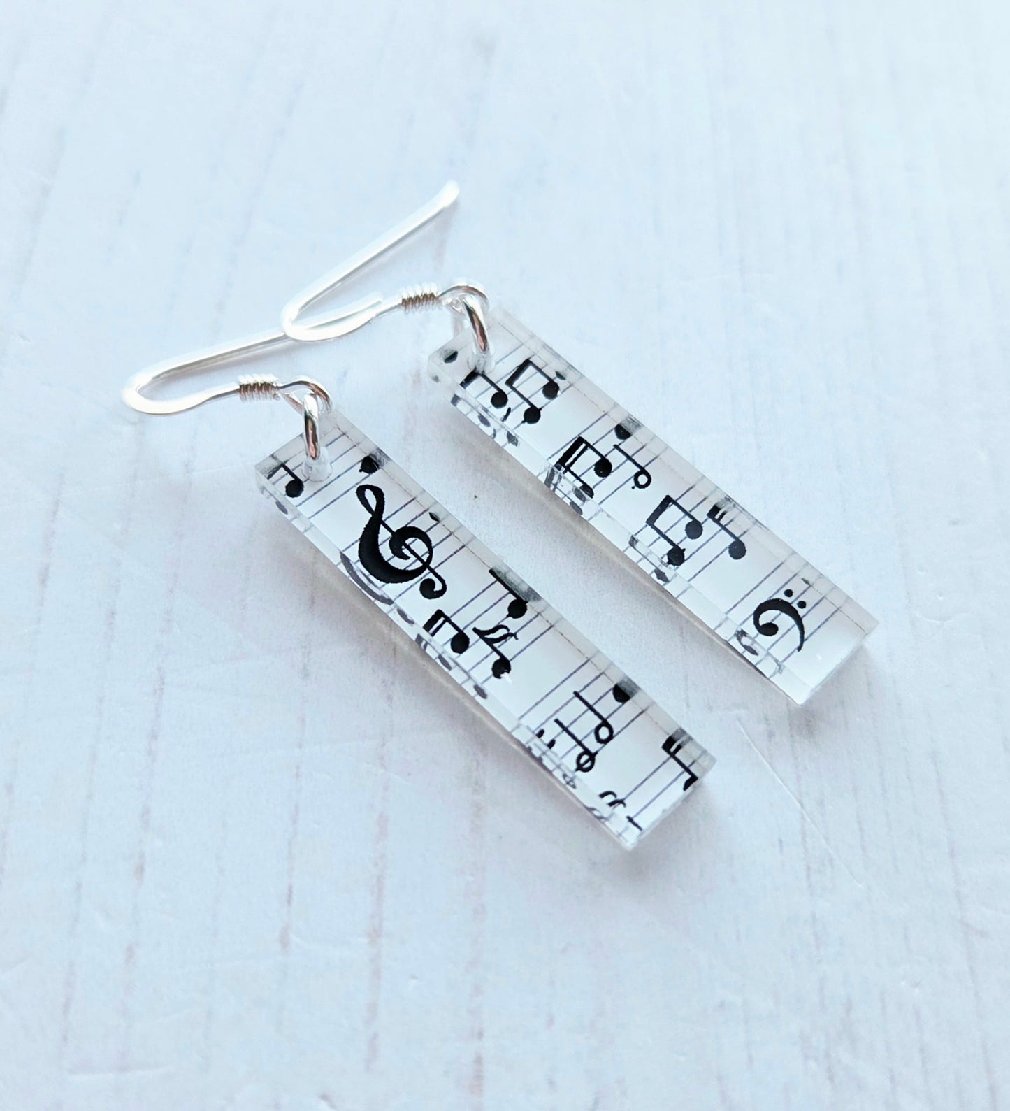 Ingot drop earrings, music note print