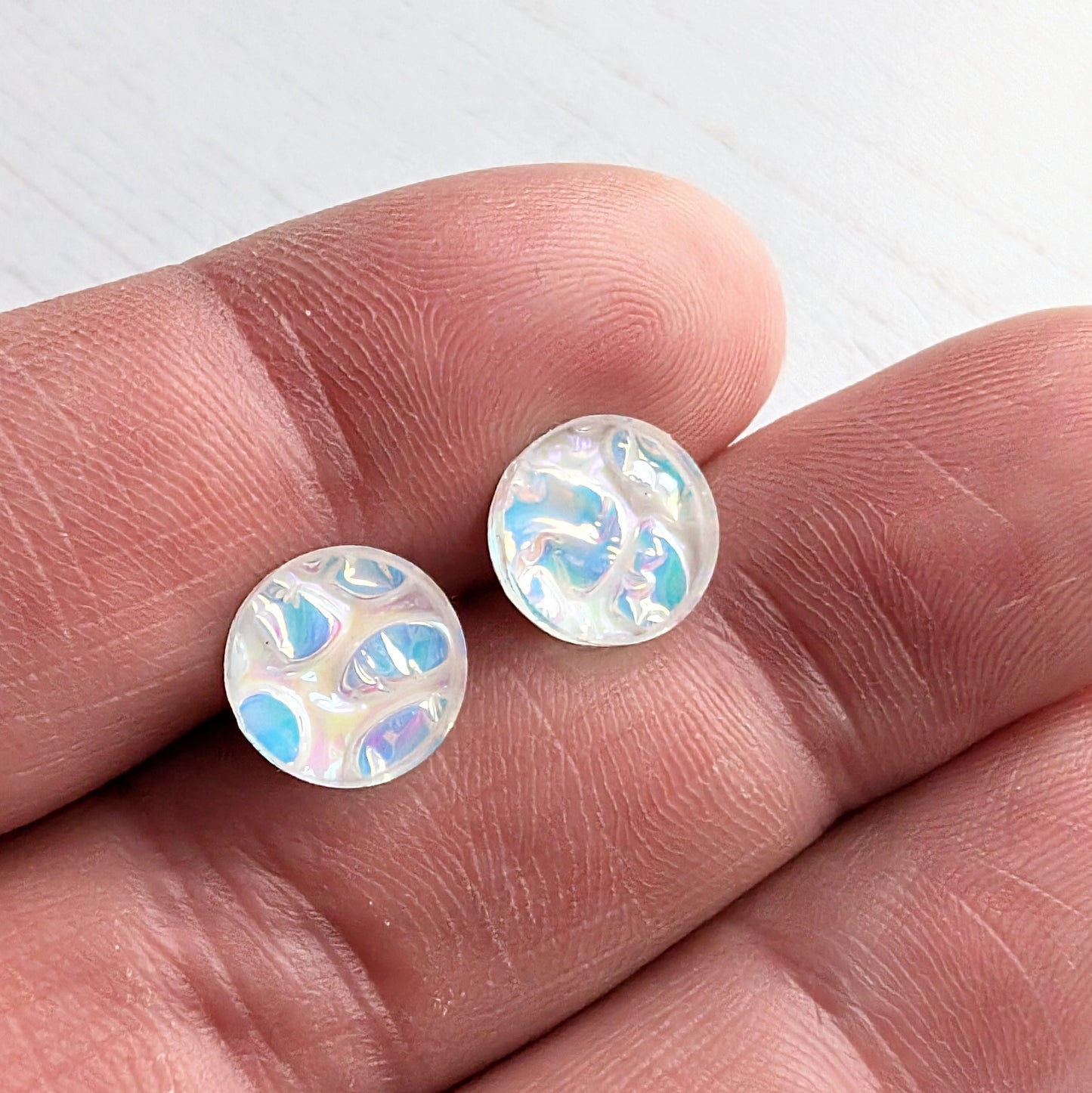 Dichrolam circle studs