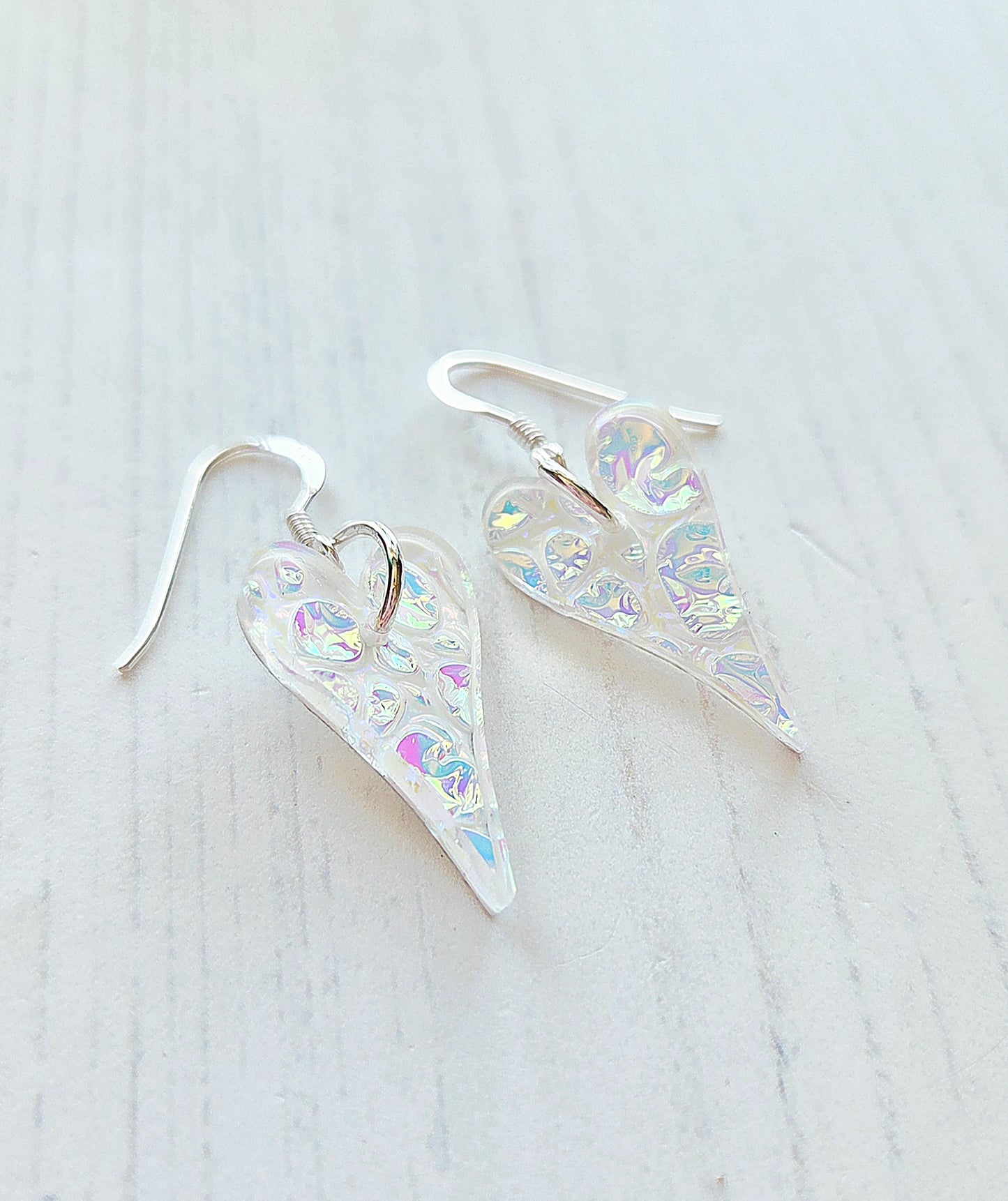 Dichrolam long heart earrings