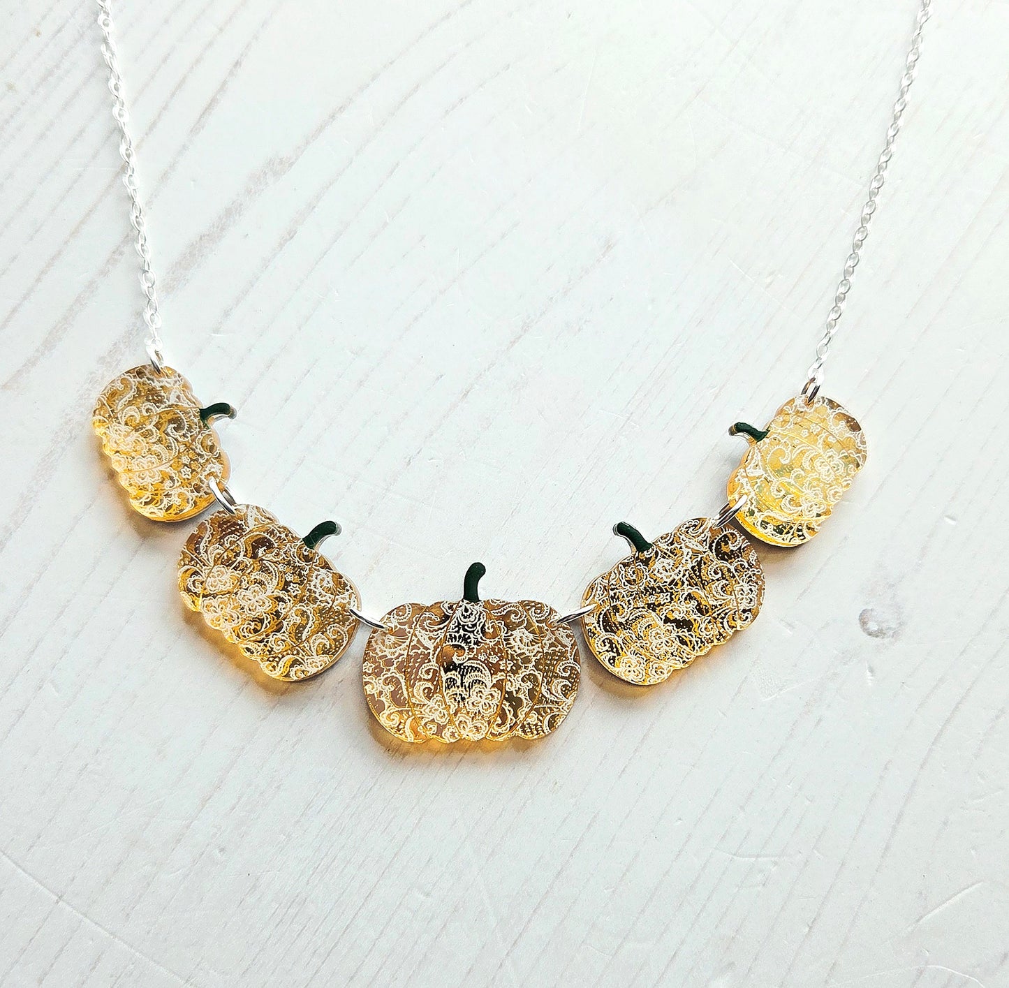 Pumpkin Statement Necklace, Gold Mirror with white lace pattern