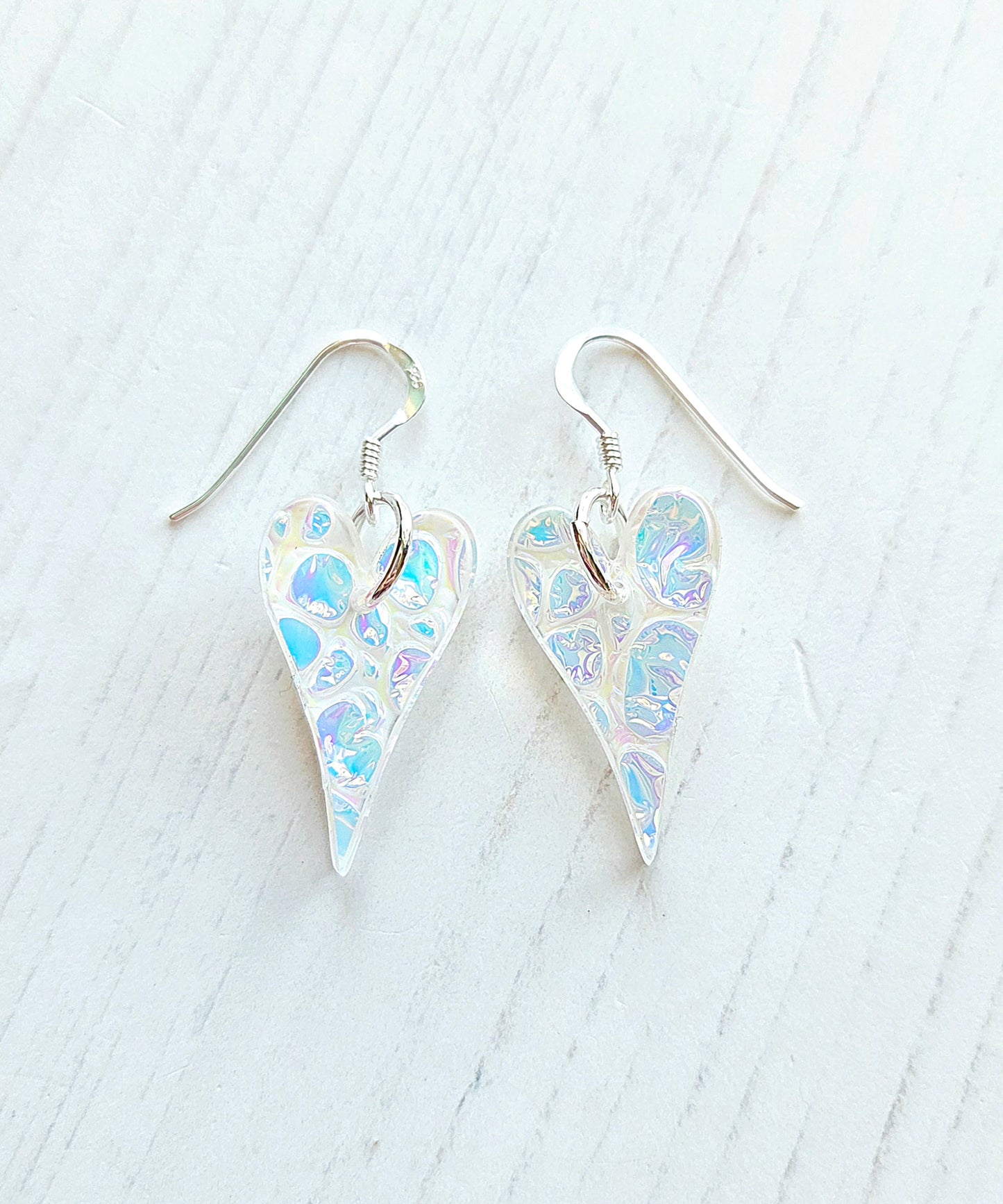 Dichrolam long heart earrings