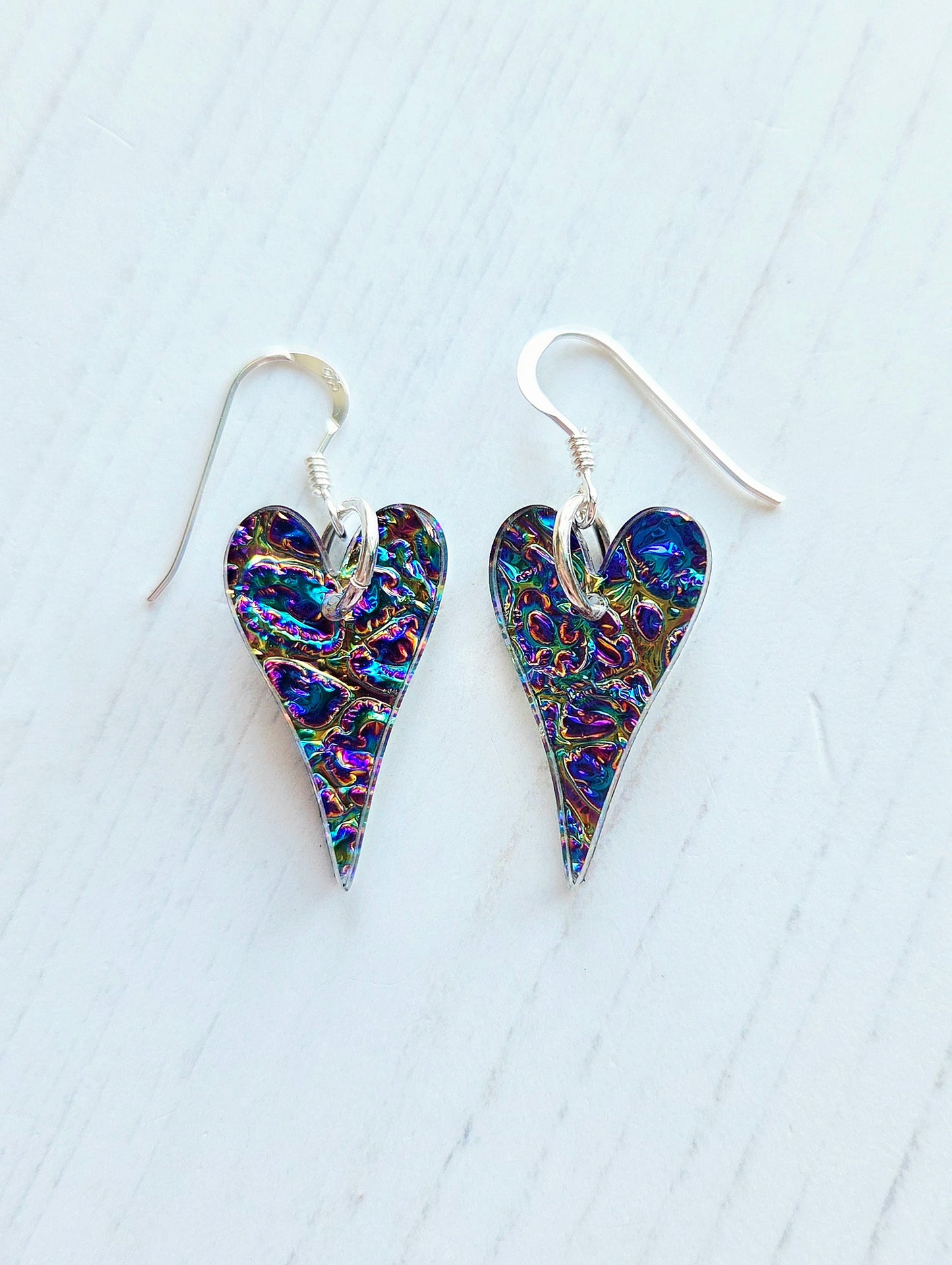 Dichrolam long heart earrings