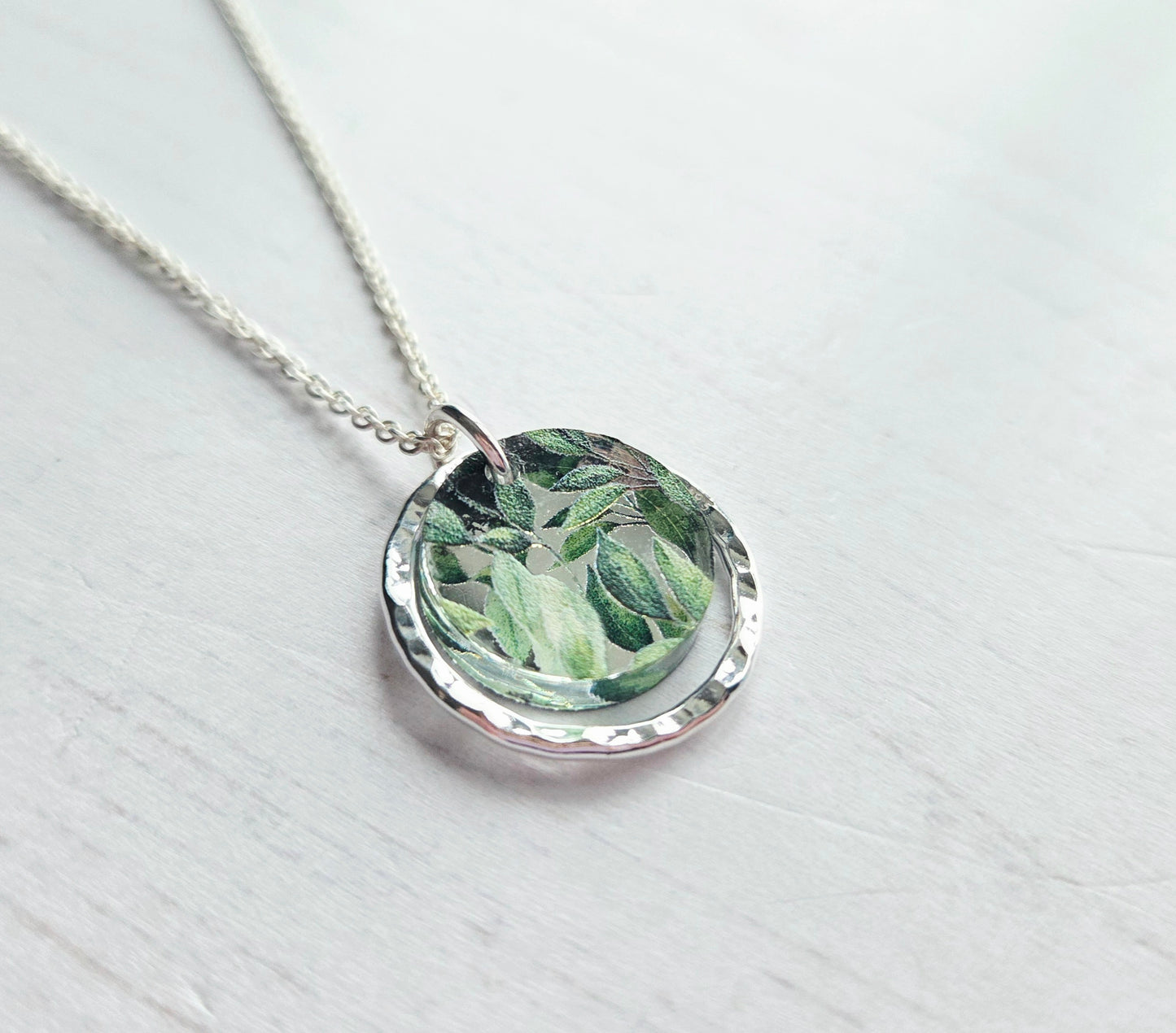 Hammered Circle Pendant, Mirror and leaves