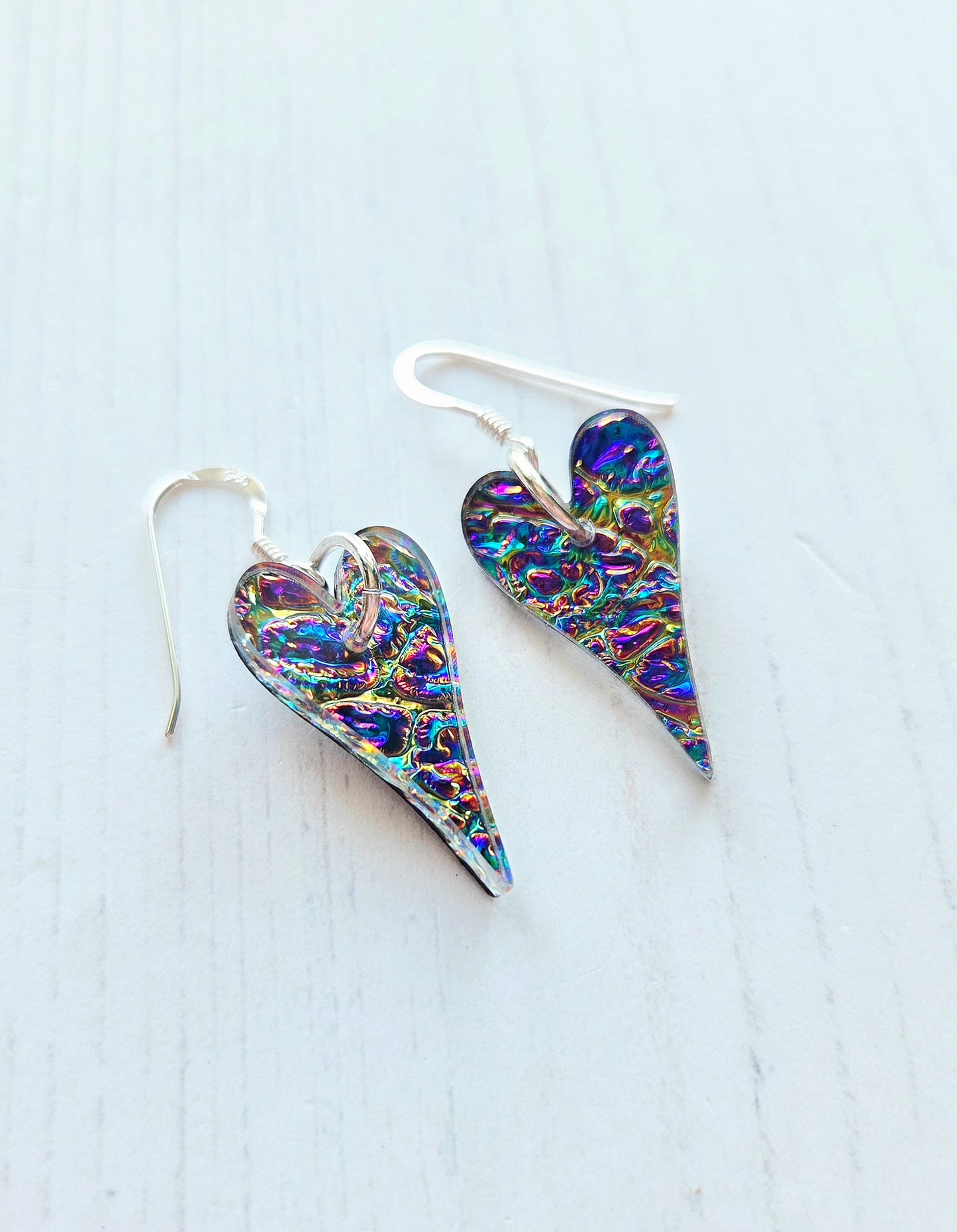 Dichrolam long heart earrings