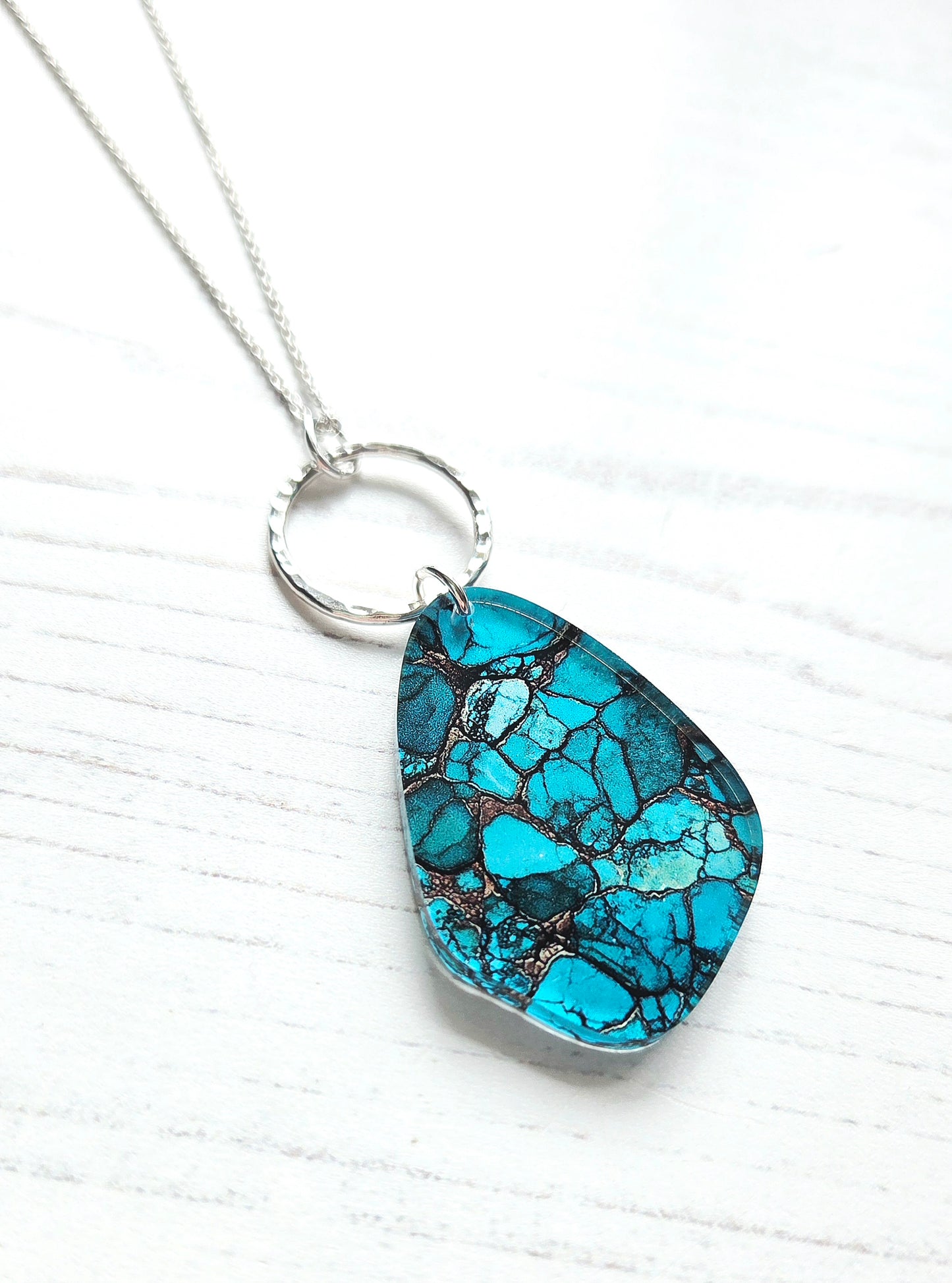 Pebble and hammered circle pendant, natural turquoise print