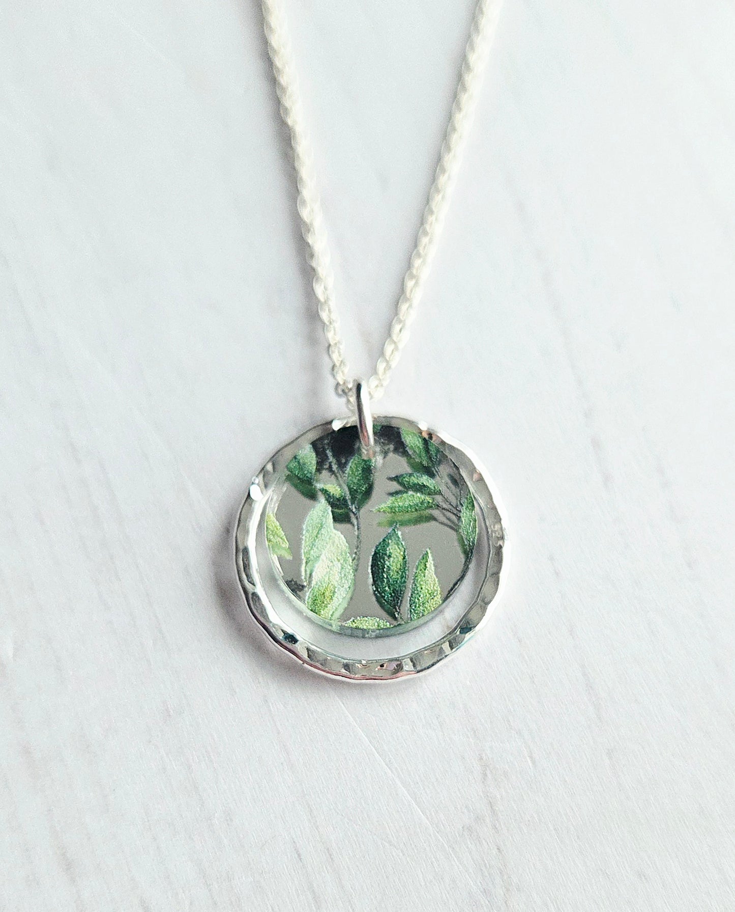 Hammered Circle Pendant, Mirror and leaves