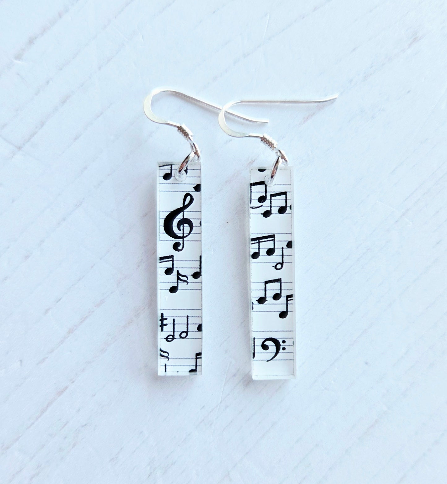 Ingot drop earrings, music note print