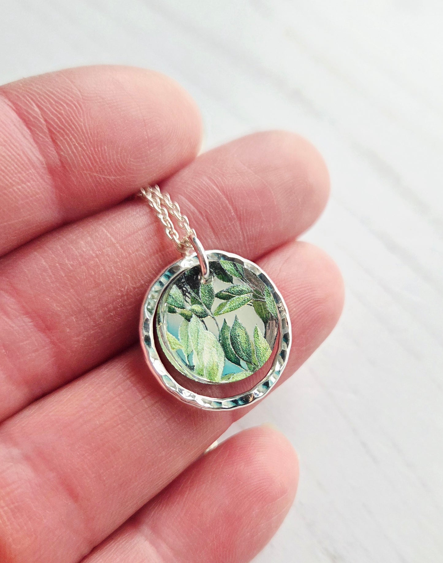 Hammered Circle Pendant, Mirror and leaves