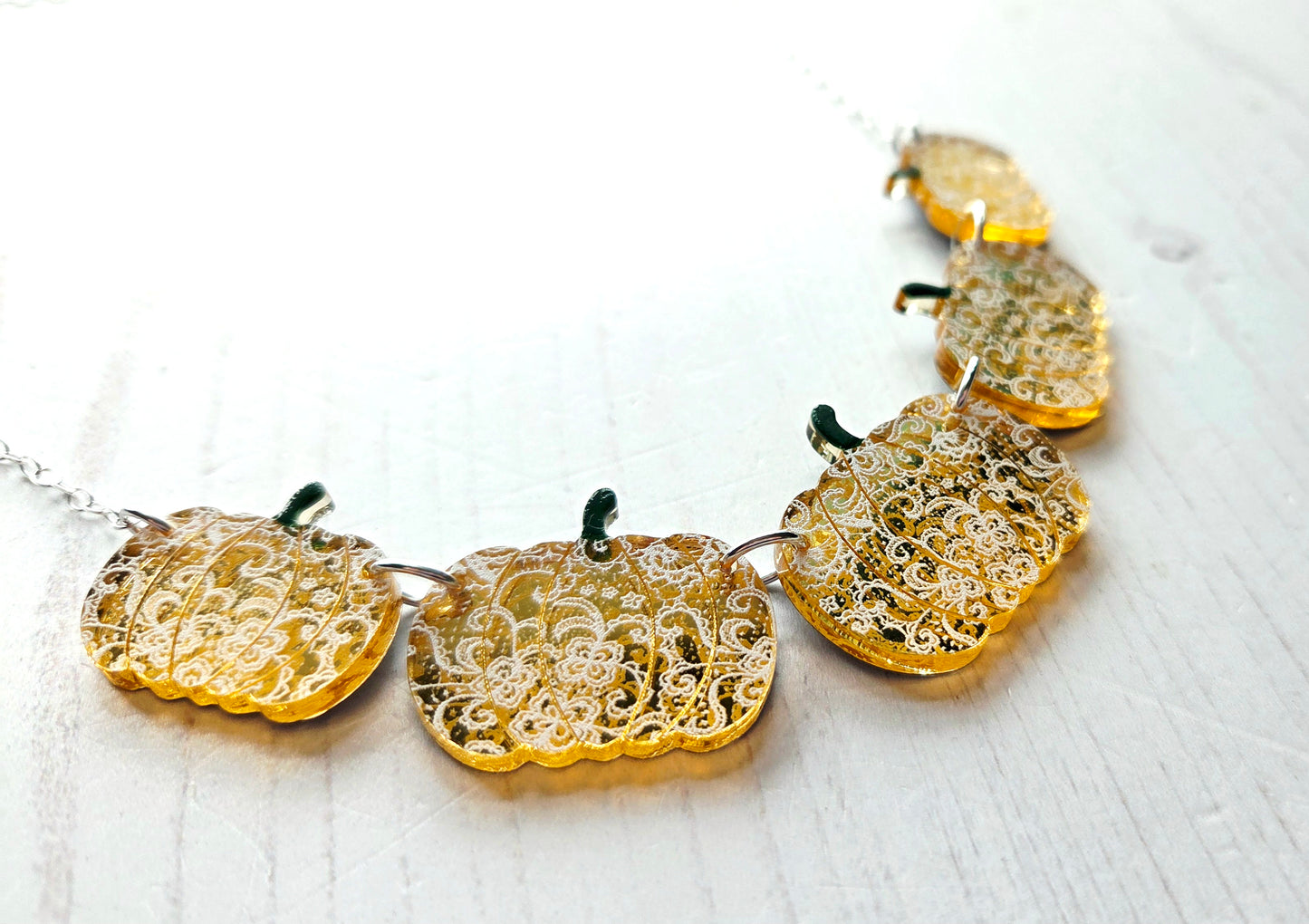 Pumpkin Statement Necklace, Gold Mirror with white lace pattern